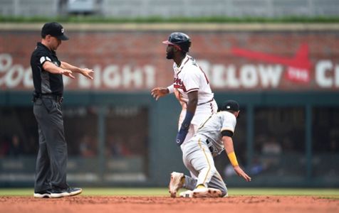 Olson hits early grand slam, NL-leading Braves add three more