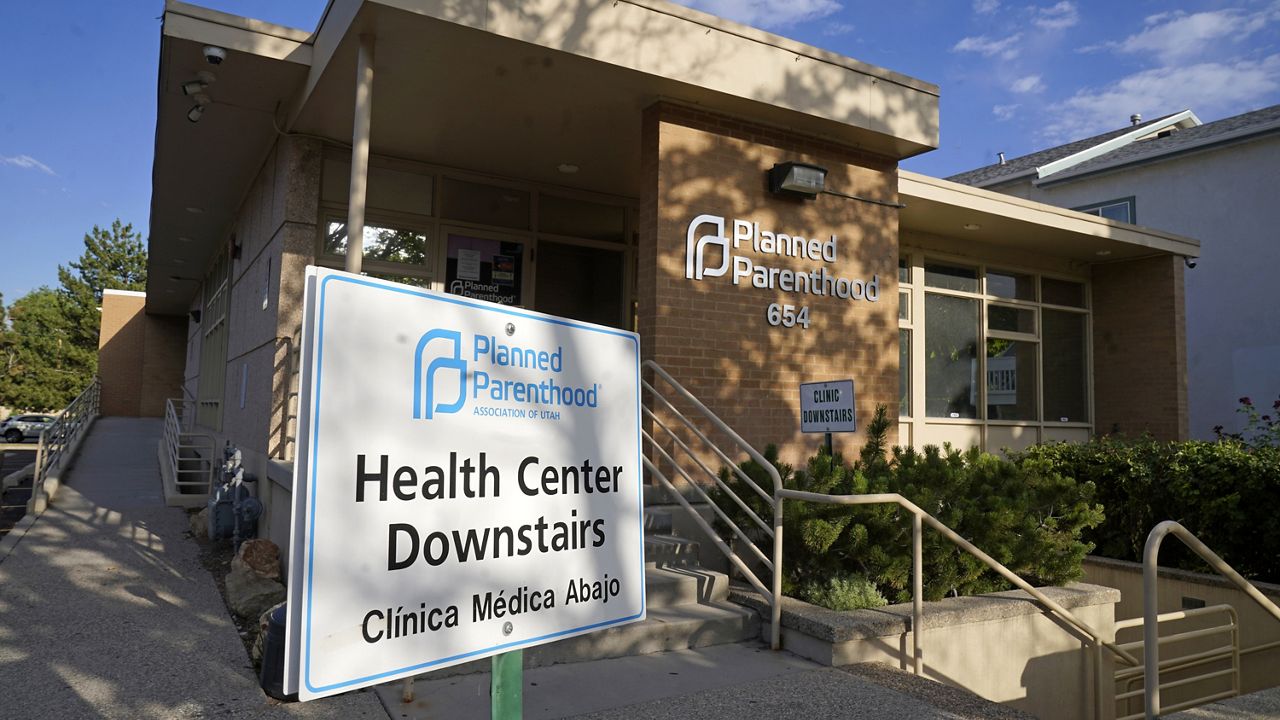 A sign stands outside Planned Parenthood of Utah on June 28, 2022, in Salt Lake City. (AP Photo/Rick Bowmer)