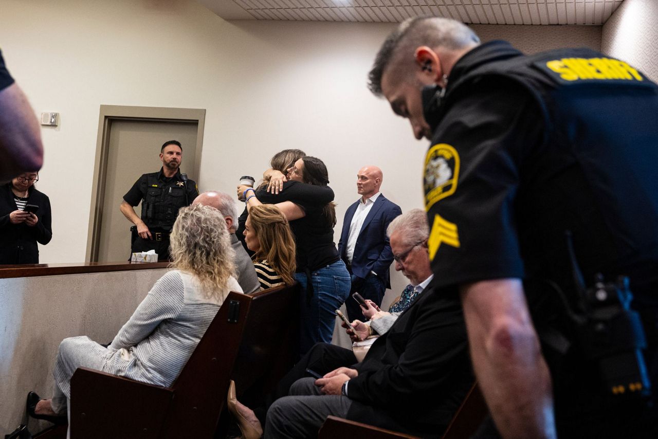 Trial of Michigan police officer charged in fatal shooting of Congolese ...