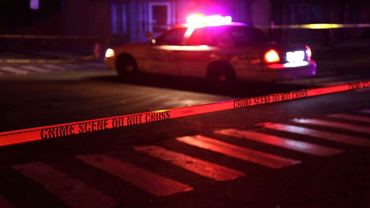 Police siren lights and crime tape. (Getty Images)