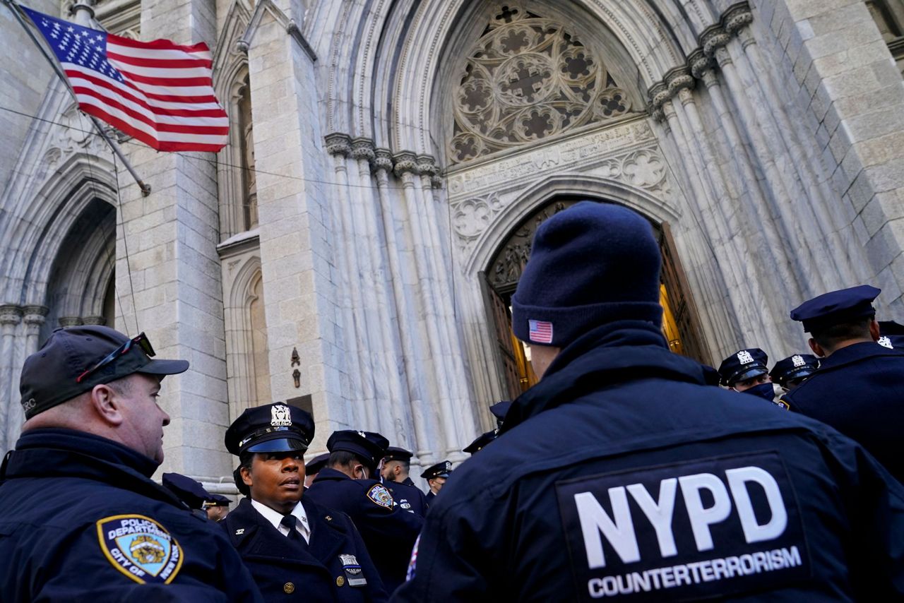 NYC officers to honor 2nd officer killed in Harlem shooting