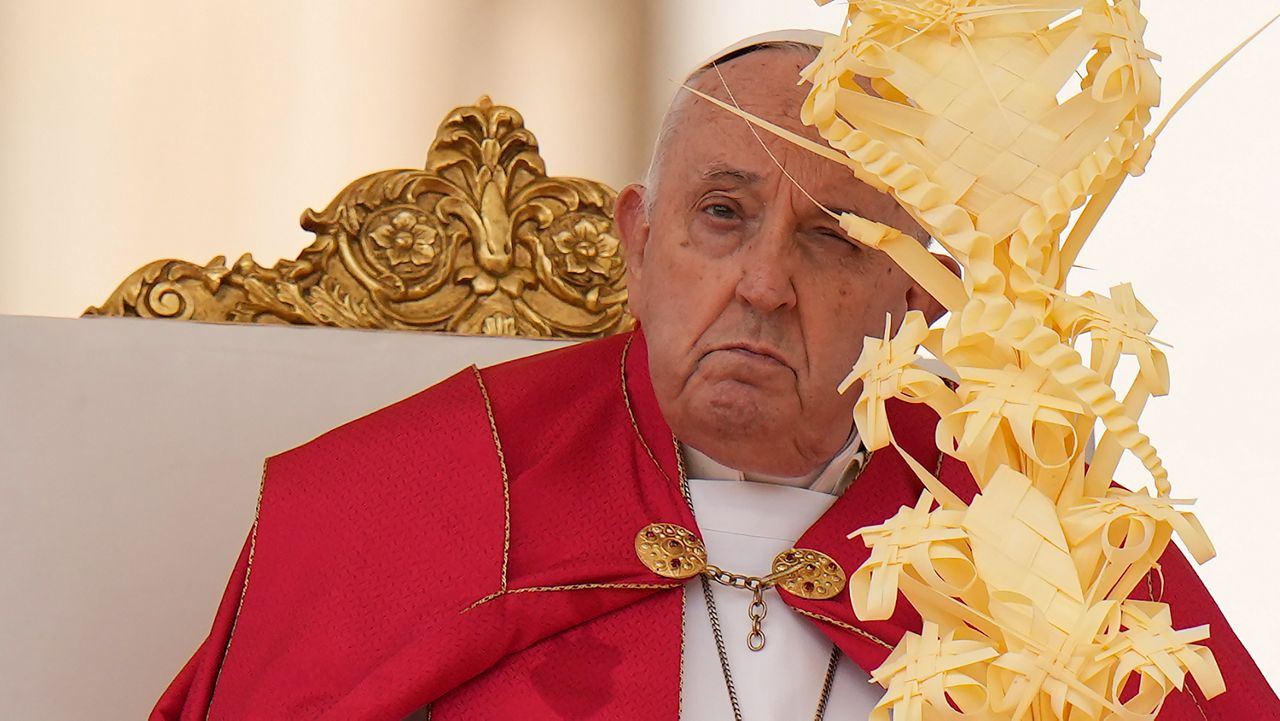 Pope Francis celebrates the Palm Sunday mass in St. Peter's Square at the Vatican, Sunday, March 24, 2024. (AP Photo/Alessandra Tarantino)