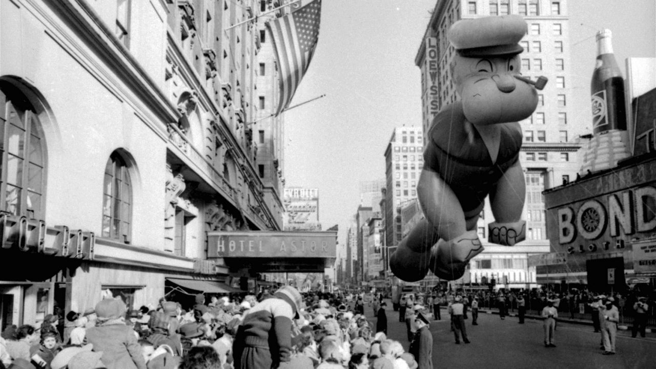 A helium-filled Popeye balloon appears in the 33rd Macy's Thanksgiving Day Parade in New York on Nov. 26, 1959. (AP Photo/File)