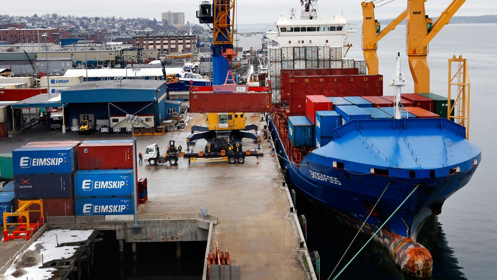 An Icelandic cargo ship is loaded with containers in Portland in 2016. (AP Photo/Robert F. Bukaty)