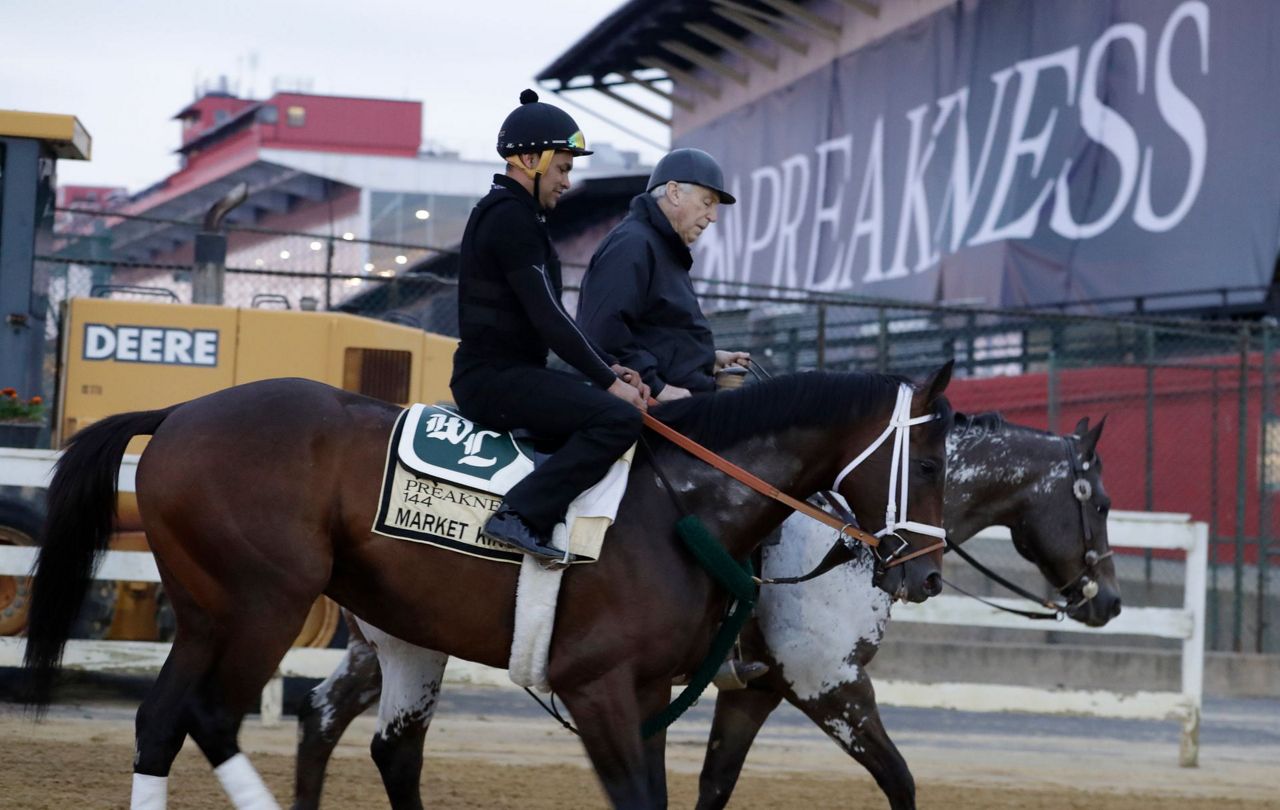 The Latest: Infield crowd sparse hours before the Preakness