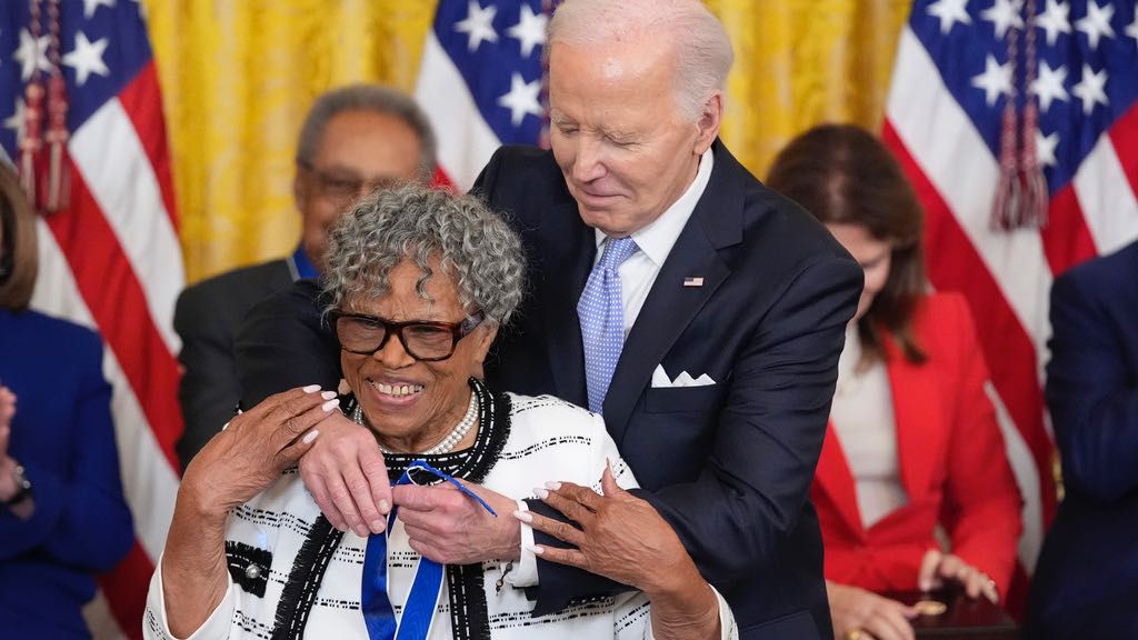 President Joe Biden awards the nation's highest civilian honor, the Presidential Medal of Freedom, to Opal Lee, the "grandmother of Juneteenth," during a ceremony in the East Room of the White House, Friday, May 3, 2024, in Washington. (AP Photo/Alex Brandon)