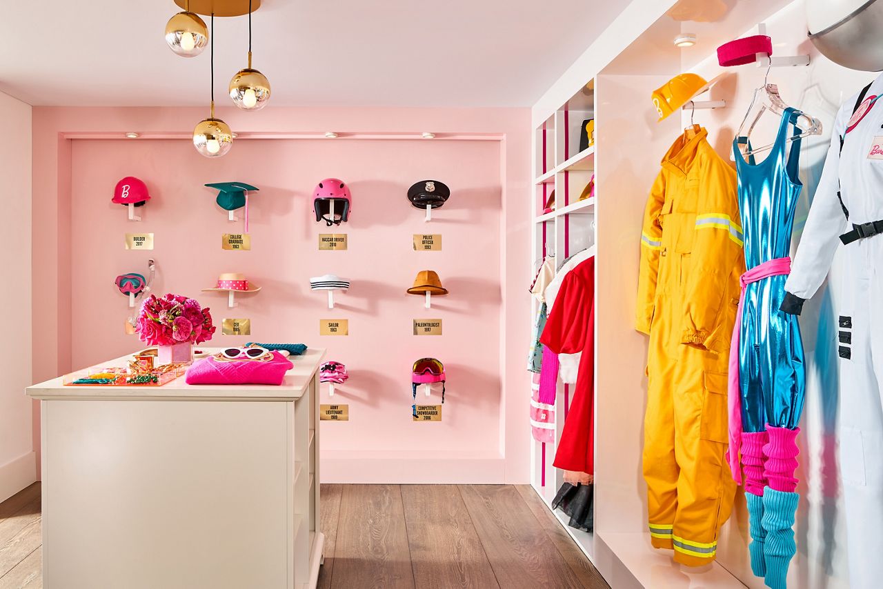 Barbie's closet features the outfits from all of her professions over her 60 years working numerous jobs, from astronaut to doctor.