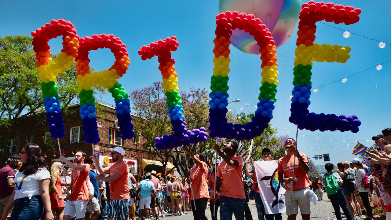 Participants take part in the annual LA Pride Parade in West Hollywood, Calif., Sunday, June 9, 2019. California Gov. Gavin Newsom signed several bills Saturday, Sept. 23, 2023, aimed at bolstering the state's protections for LGBTQ+ people, despite a controversial veto the day before that was criticized by advocates. (AP Photo/Richard Vogel, File)