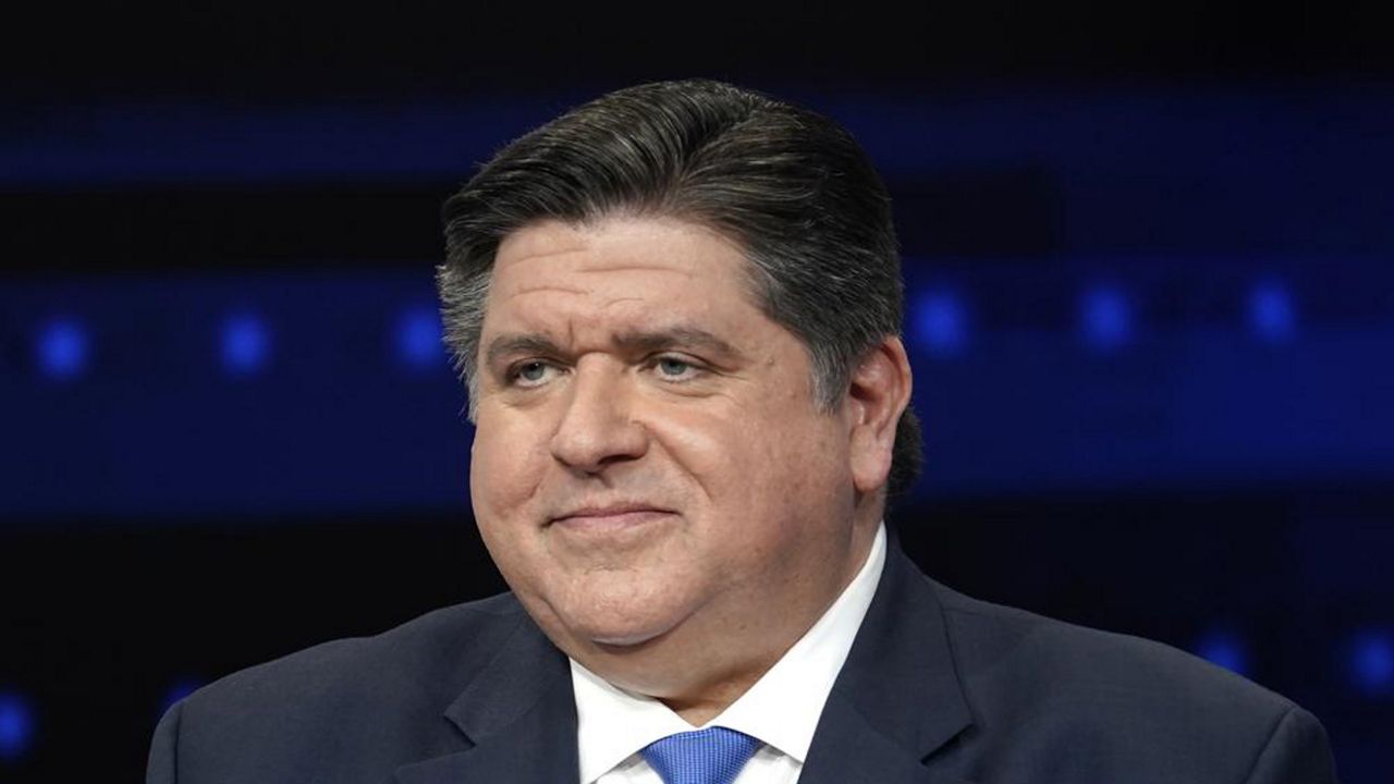 Illinois Gov. JB Pritzker participates in a debate with Republican gubernatorial challenger state Sen. Darren Bailey at the WGN9 studios, Tuesday, Oct. 18, 2022, in Chicago. (AP Photo/Charles Rex Arbogast, File)