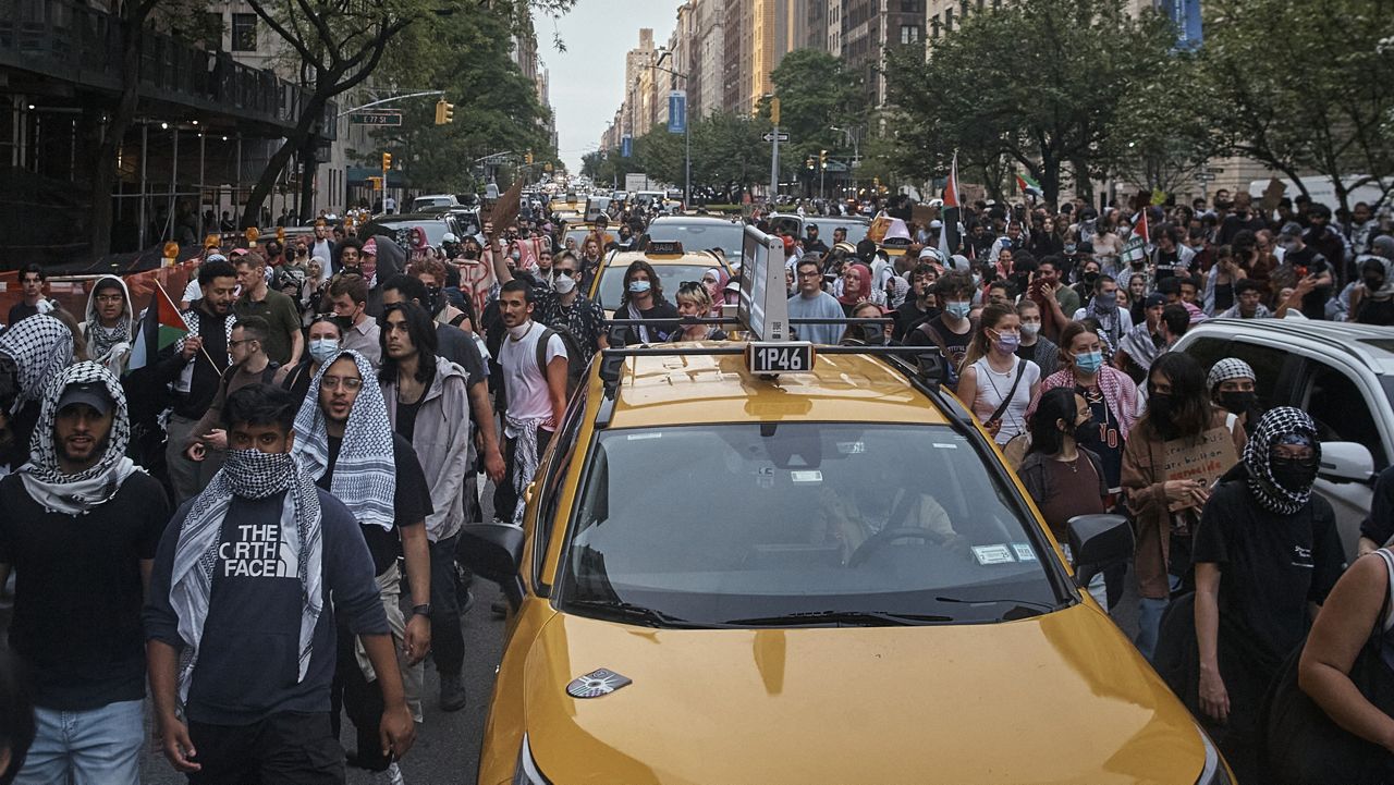 NY1 cameras witnessed protesters being arrested near East 79th Street and Fifth Avenue. (Spectrum News NY1)