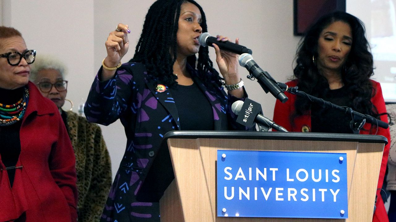 Robin Proudie, a descendant of those enslaved by St. Louis University and president of DSLUE, speaks during Thursday's media briefing at Busch Student Center. (Spectrum News/Elizabeth Barmeier)