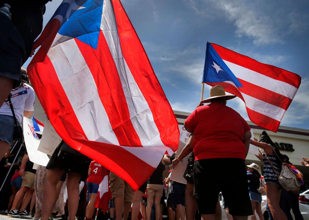 Puerto Rico gov will not seek re-election, leaves his party