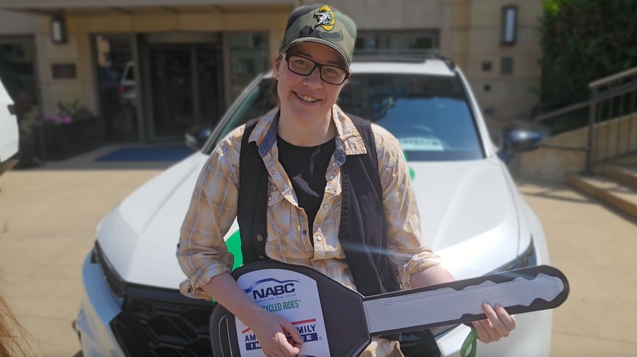 Heather Gautsch, a Madison-based queer veteran and poet, received a 2025 Honda hybrid through the NABC Recycled Rides program.