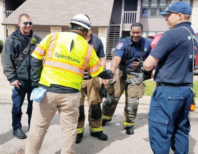 Spectrum field technician Joel Mendoza saved the life of a boy trapped in a house fire. 