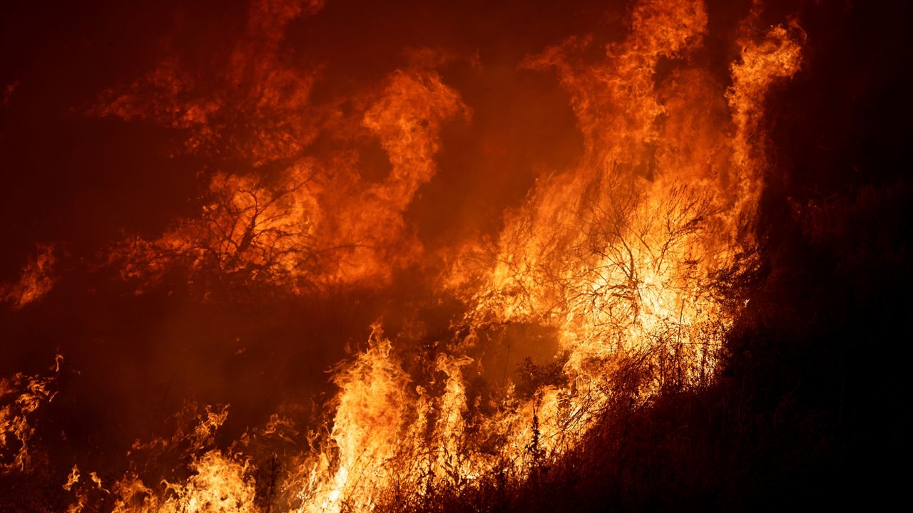 In this photo provided by the National Park Service smoke rises from the Pika Fire in Yosemite National Park, Calif., on Saturday. (Mark Ruggiero/National Park Service via AP)