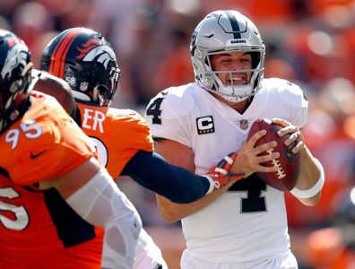 Denver Broncos kicker Brandon McManus (8) kicks the game winning field goal  as punter Marquette King (1) holds during the second half of an NFL  football game against the Oakland Raiders, Sunday