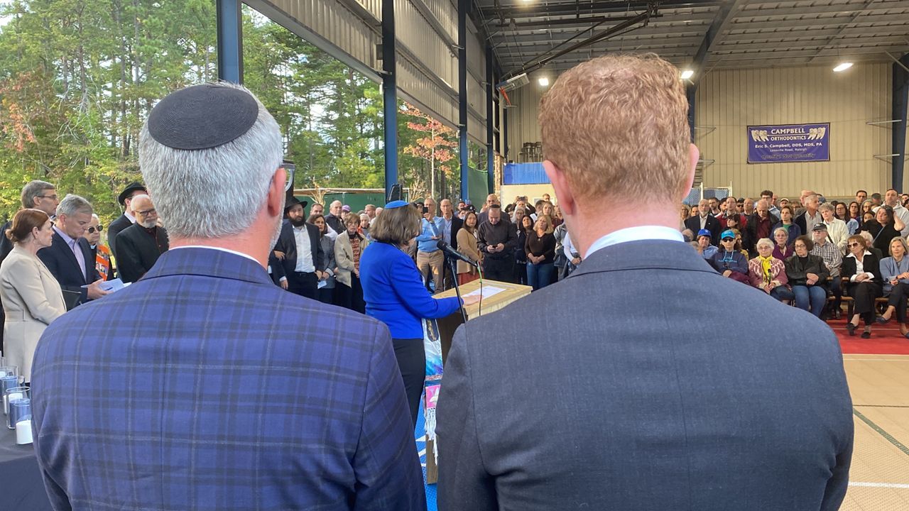 Rabbi Eric Solomon (left) stands next to Phillip Brodsky (right), the executive director of the Raleigh-Cary Jewish Federation.