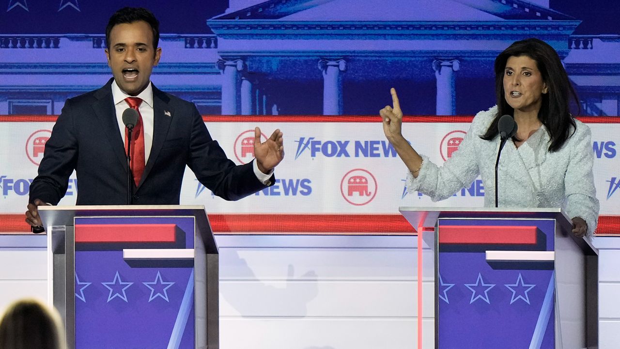 Businessman Vivek Ramaswamy, left, and former U.N. Ambassador Nikki Haley speak during a Republican presidential primary debate hosted by FOX News Channel, Aug. 23, 2023, in Milwaukee. Ramaswamy and Haley, two of the leading contenders for the Republican presidential nomination, are Indian Americans, even though polling points to an Indian diaspora that overwhelmingly votes Democrat. The two candidates are running significantly behind former President Donald Trump and also trail Florida Gov. Ron DeSantis, but they’re outpacing others in the field. (AP Photo/Morry Gash, File)