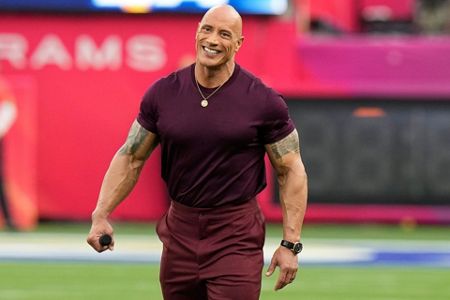 Actor Dwayne Johnson announces the start of the NFL Super Bowl 56 football  game between the Cincinnati Bengals and the Los Angeles Rams Sunday, Feb.  13, 2022, in Inglewood, Calif. (AP Photo/Ted