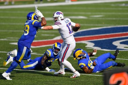 The Evening Sun  Bills Rally To Beat Rams 35-32 After Blowing 25