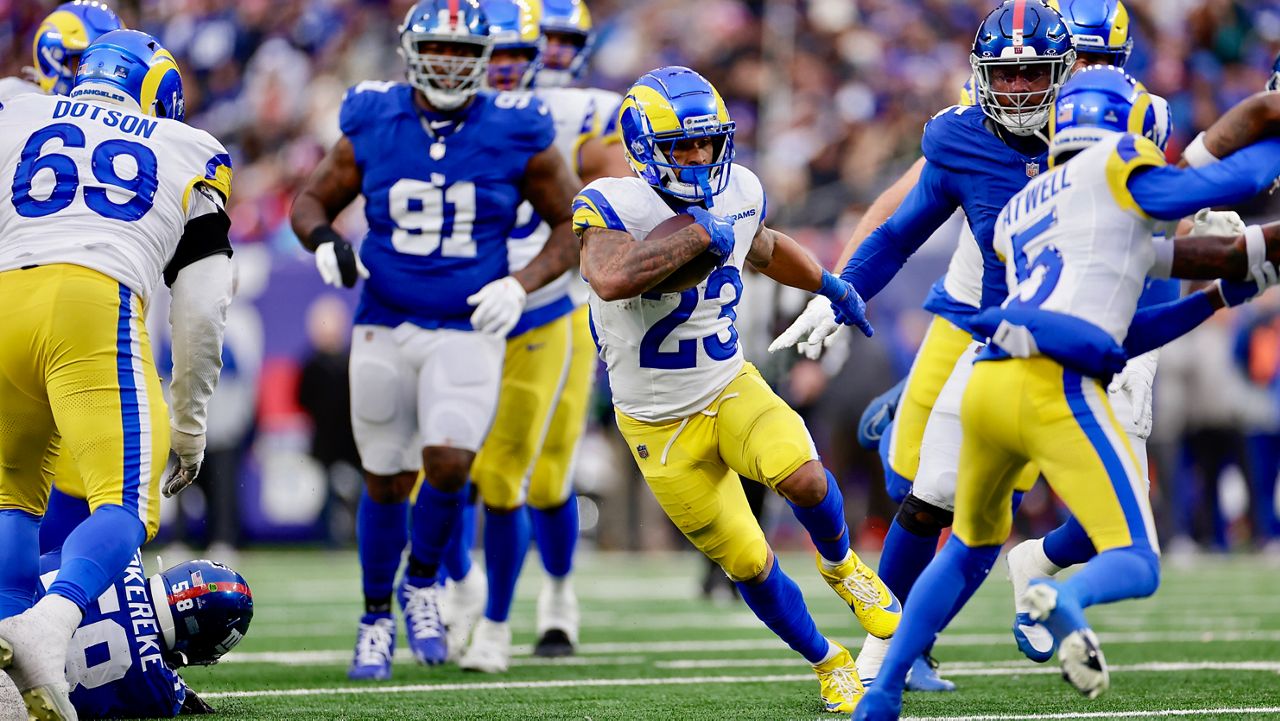 Los Angeles Rams running back Kyren Williams (23) runs in a touchdown during the second half an NFL football game against the New York Giants, Sunday, Dec. 31, 2023, in East Rutherford, N.J. (AP Photo/Adam Hunger)