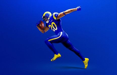 Chargers unveil new uniforms, numbered helmet