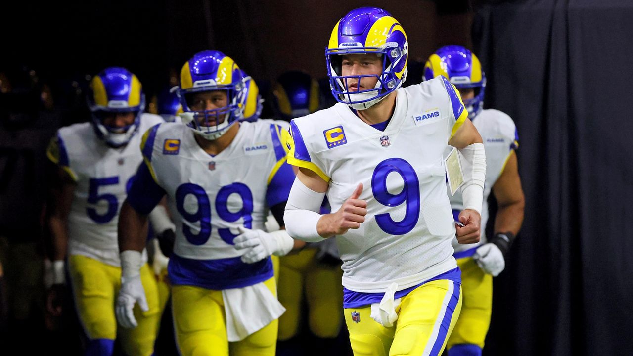 FILE -Los Angeles Rams quarterback Matthew Stafford (9) runs onto the field before an NFL football game. (AP Photo/Butch Dill, File)