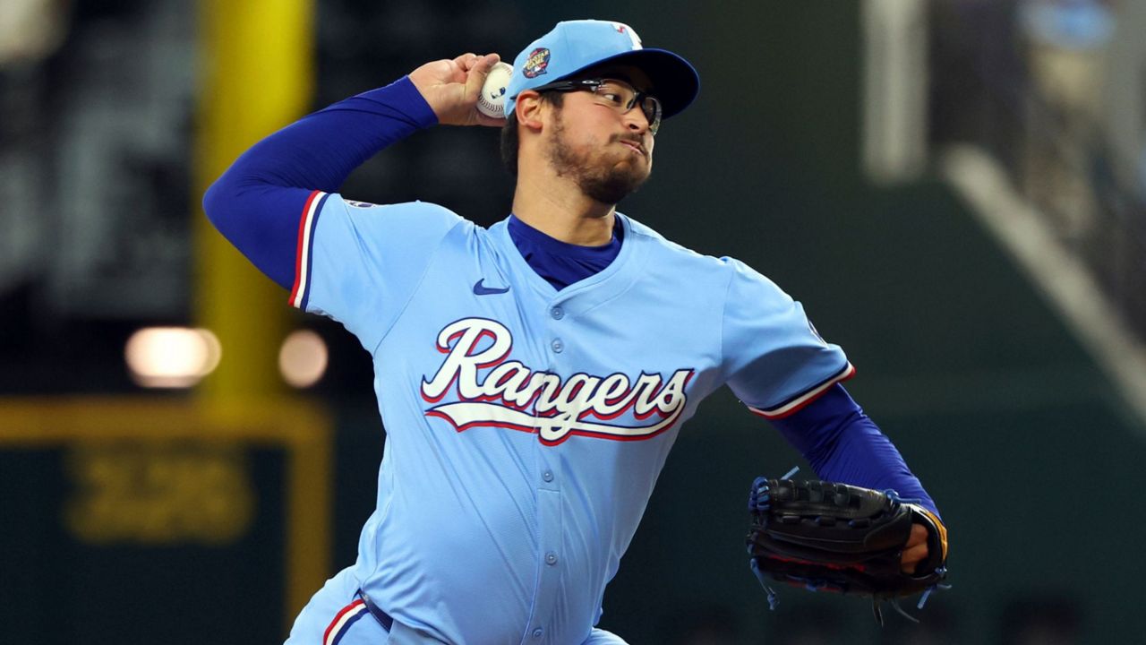 Texas Rangers starting pitcher Dane Dunning delivers against the Cincinnati Reds in the first inning of a baseball game Sunday, April 28, 2024, in Arlington, Texas. (AP Photo/Richard W. Rodriguez)