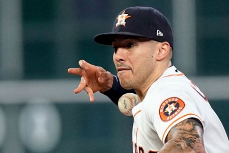 Altuve slam in 10th lifts Astros over Rangers on Baker B-day