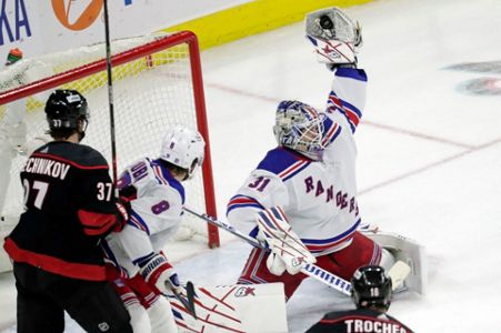 New York Rangers' Tyler Motte looks on after scoring an empty-net goal  against the Carolina Hurricanes during the third period of Game 3 of an NHL  hockey Stanley Cup second-round playoff series