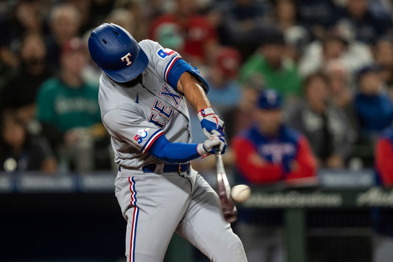 Mariners outlast Rangers in 11, close in on playoff berth