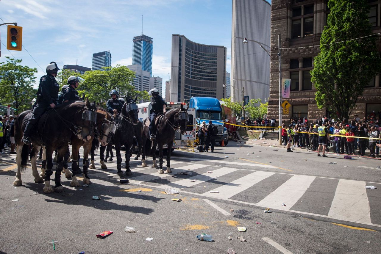 Huge crowds pack downtown Toronto for Raptors parade