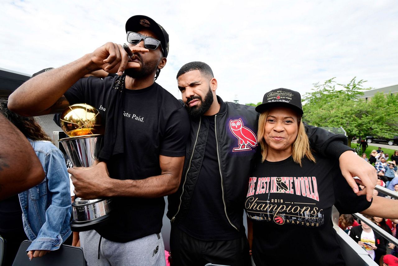 Huge crowds pack downtown Toronto for Raptors parade