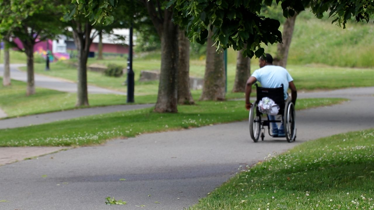 Rasool Muhammad rolls through a Rochester park, finding peace, purpose, and support on his journey after surviving a life-changing gunshot injury. 