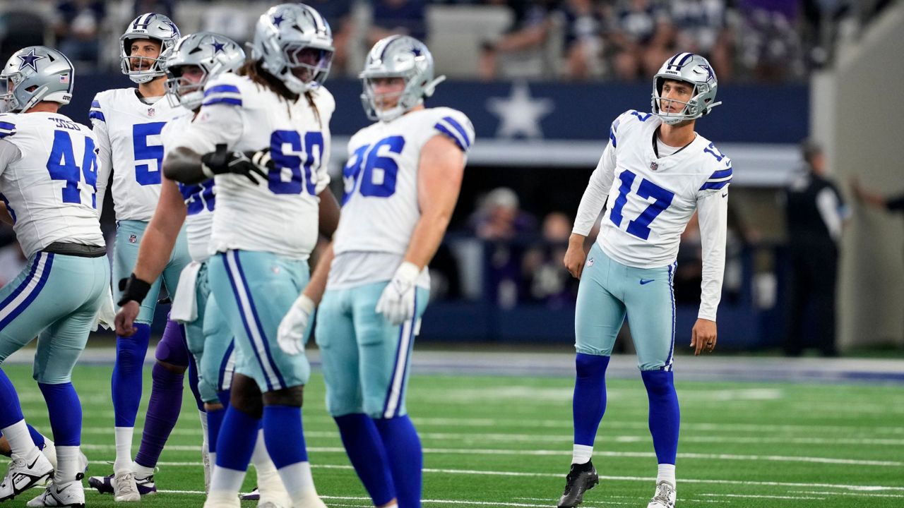 Dallas Cowboys' Brandon Aubrey (17) and the rest of the line watch Aubrey's 65-yard field goal go through the uprights in the first half of an NFL football game against the Baltimore Ravens in Arlington, Texas, Sunday, Sept. 22, 2024. (AP Photo/Jeffrey McWhorter)