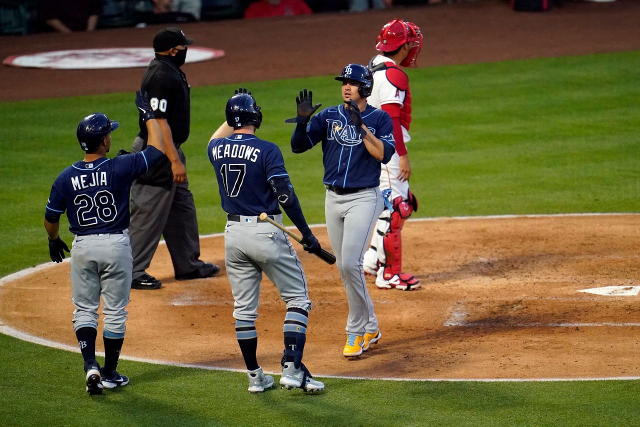 Tampa Bay Rays' Willy Adames (1) celebrates his solo home run