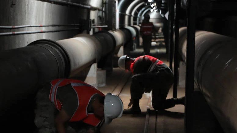 Service members assigned to Joint Task Force-Red Hill apply sealant to drain plugs during the implementation of additional aquifer protective measures at the Red Hill Bulk Fuel Storage Facility on Aug. 10, 2023. (Photo courtesy of Joint Task Force Red Hill)