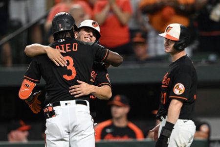 Jorge Mateo and Rougned Odor of the Baltimore Orioles celebrate