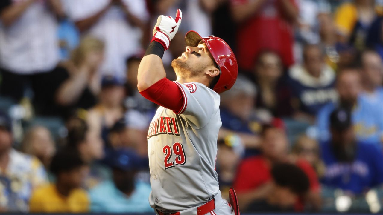 Cincinnati Reds' TJ Friedl gestures after his home run agains the Milwaukee Brewers during the third inning of a baseball game Friday, June 14, 2024, in Milwaukee. (AP Photo/Jeffrey Phelps)