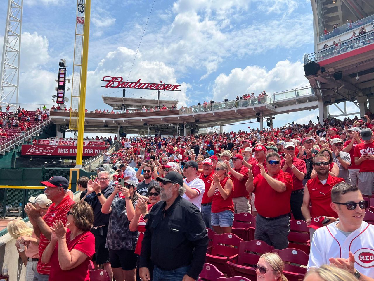 Reds celebrate during an afternoon win in Cincinnati. (Photo courtesy of Adam Koehler)