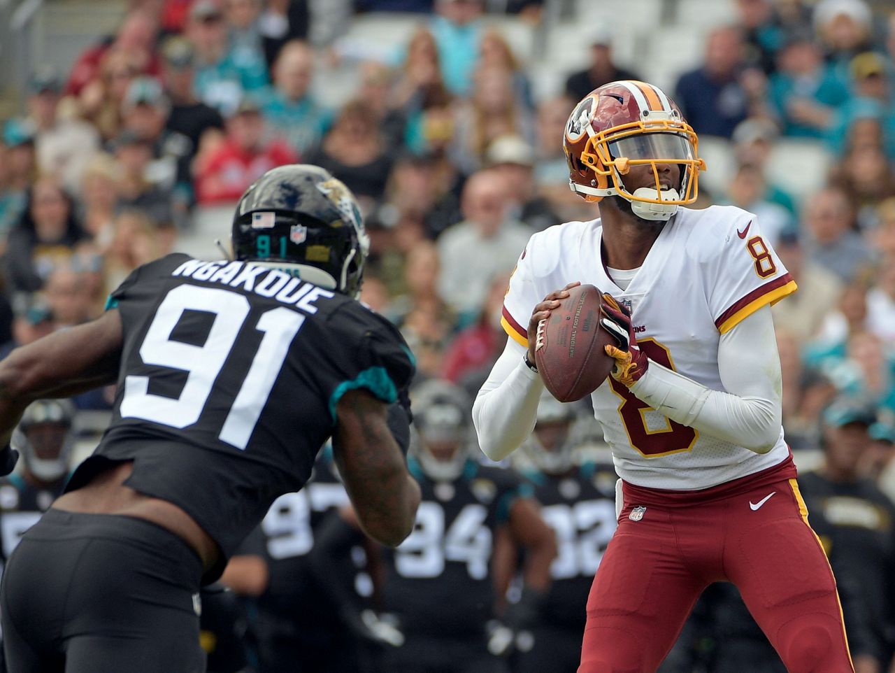 Johnson leads Redskins to late scores, 16-13 win at Jaguars