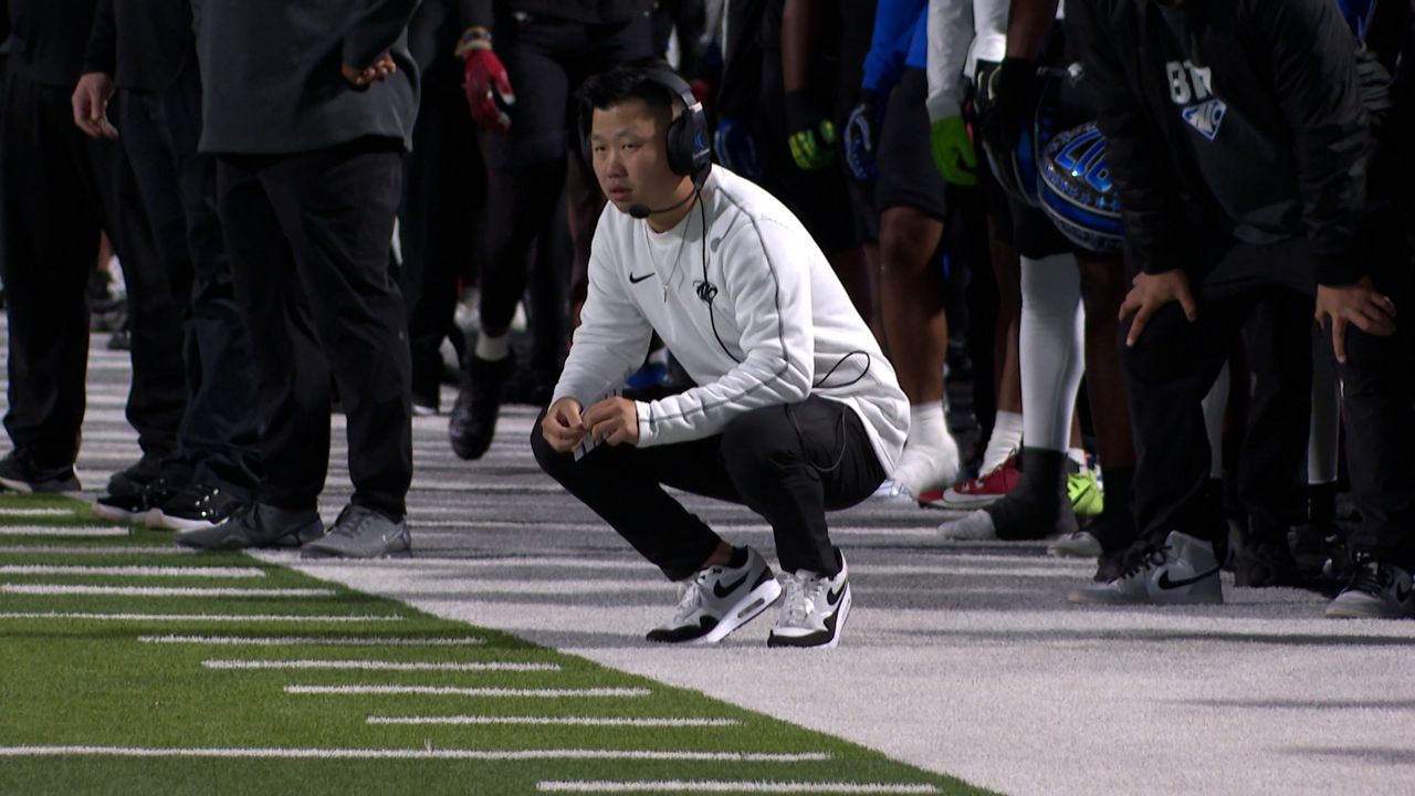 North Crowley offensive coordinator Eli Reinhart on the sidelines. (Spectrum News 1/Adam Rossow)