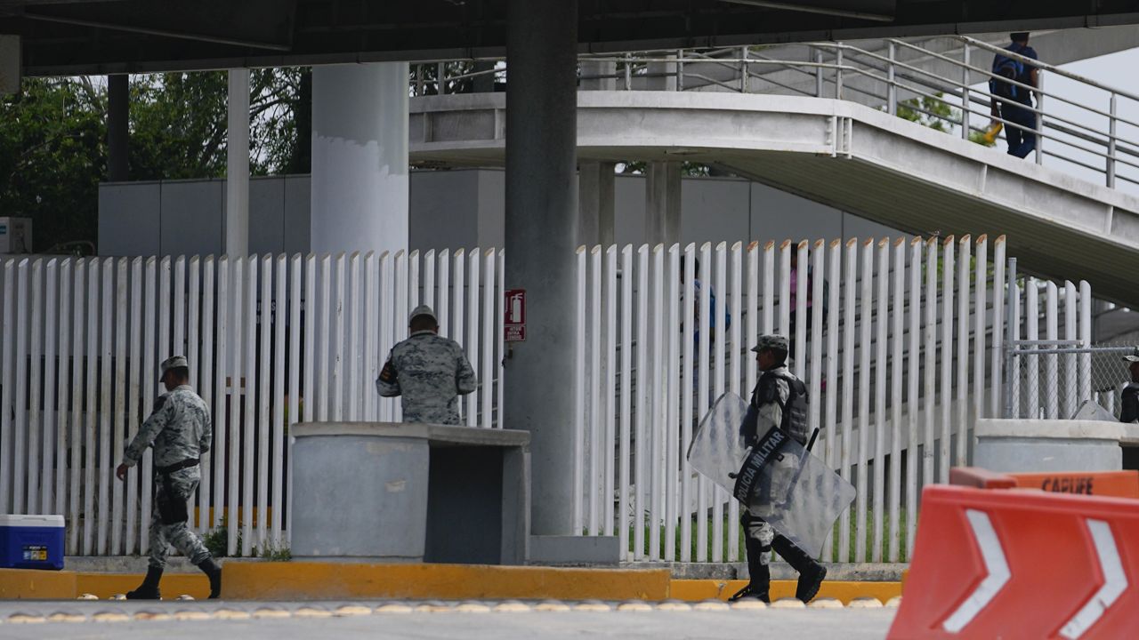 Mexican military are seen on the Mexico side of the McAllen-Hidalgo International Bridge, Friday, May 12, 2023, in Reynosa, Mexico. (AP Photo/Julio Cortez)