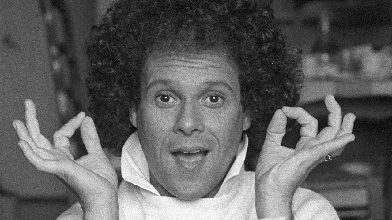 Richard Simmons sits for a portrait in Los Angeles, June 23, 1982. Simmons, a fitness guru who urged the overweight to exercise and eat better, died Saturday, July 13, 2024, at the age of 76. (AP Photo/Richard Drew, File)