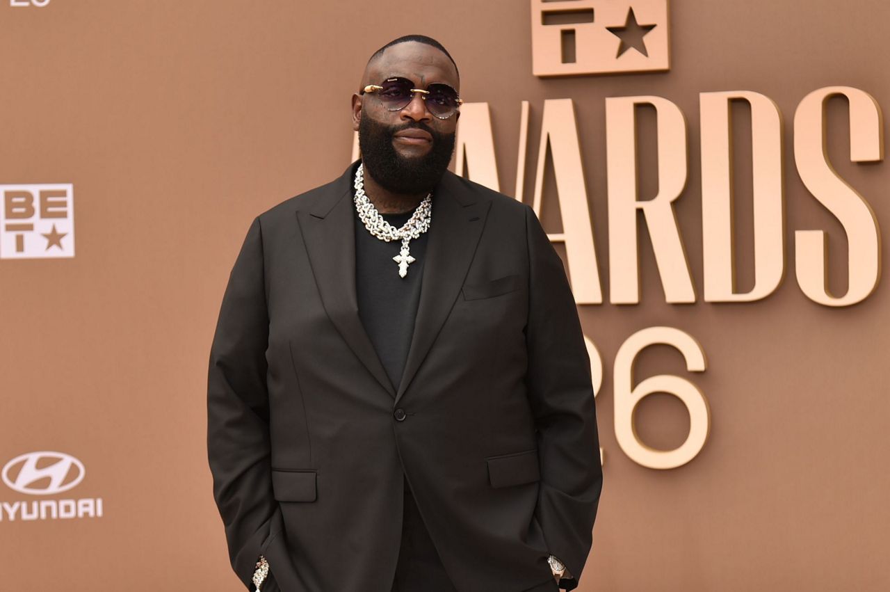 Rapper Rick Ross charged with battery after domestic violence accusation
