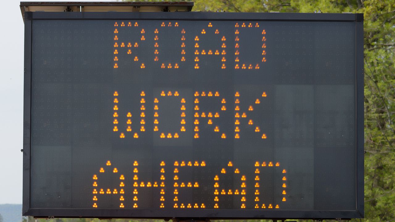 Road work ahead sign.