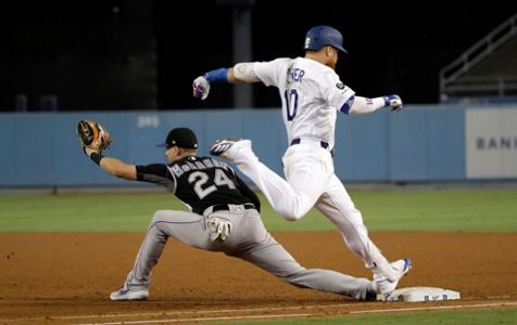 Pederson's 2 HRs give Dodgers NL record in 7-3 win over Rox