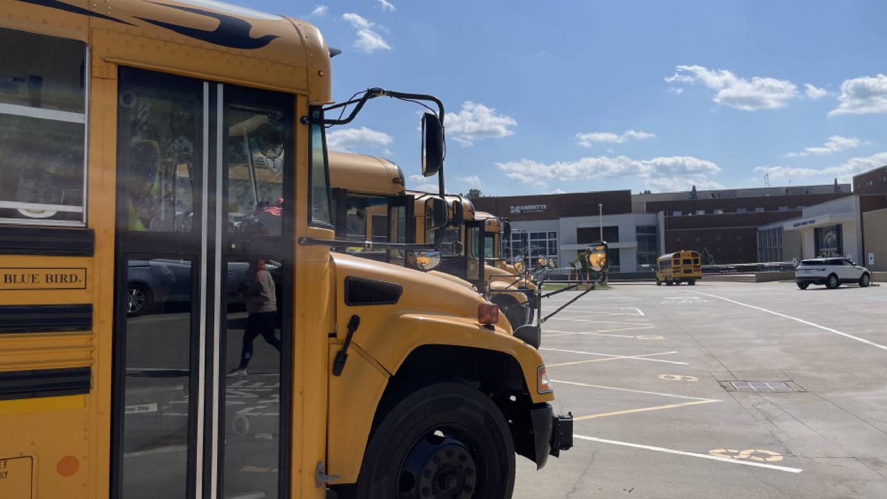 School buses line up in front of Marquette High School in the Rockwood School District on Aug. 29, 2023 in Chesterfield, Mo. (Spectrum News/Gregg Palermo)