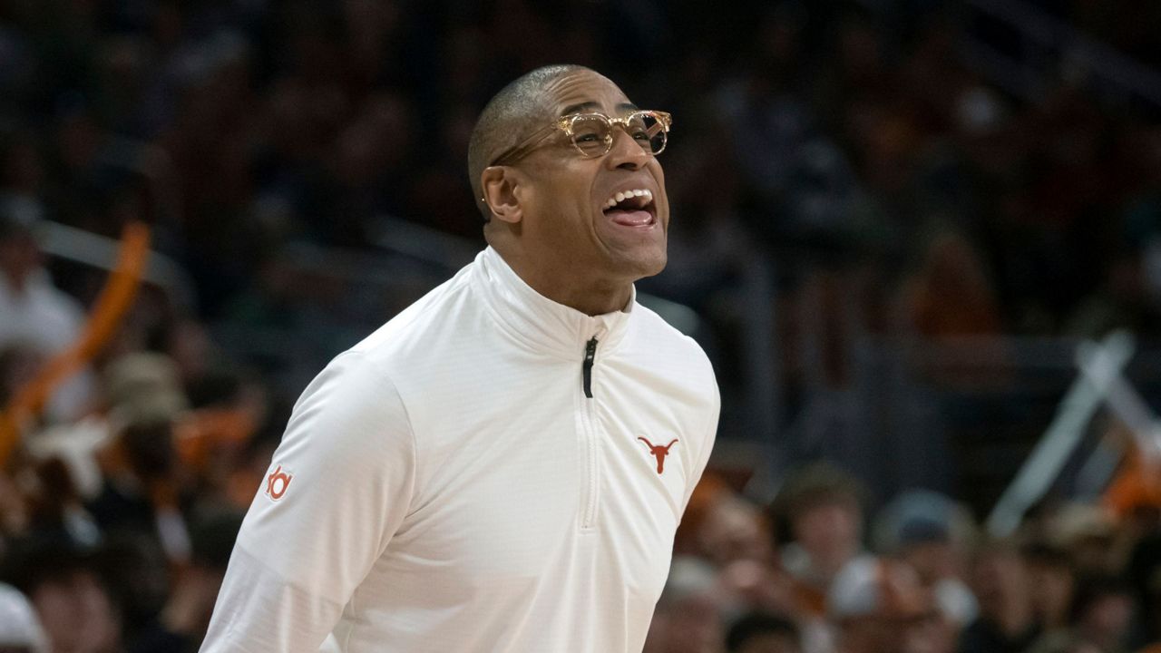 Texas head coach Rodney Terry calls out to his team during the second half of an NCAA college basketball game against Baylor, Saturday, Jan. 20, 2024, in Austin, Texas. Texas won 75-73. (AP Photo/Michael Thomas)