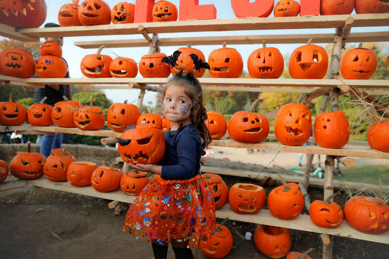 AP PHOTOS Romania hosts carving of over 30,000 pumpkins